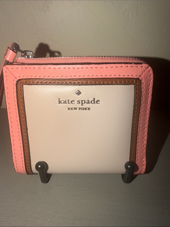 kate spade Handbags - kate spade two-tone pink and cream zip-around wallet